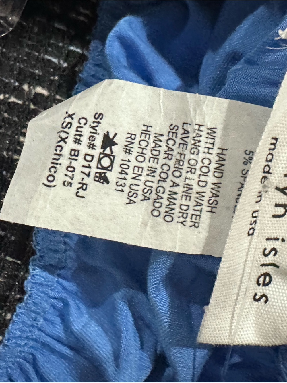 Blue ruffled skirt with stitched label